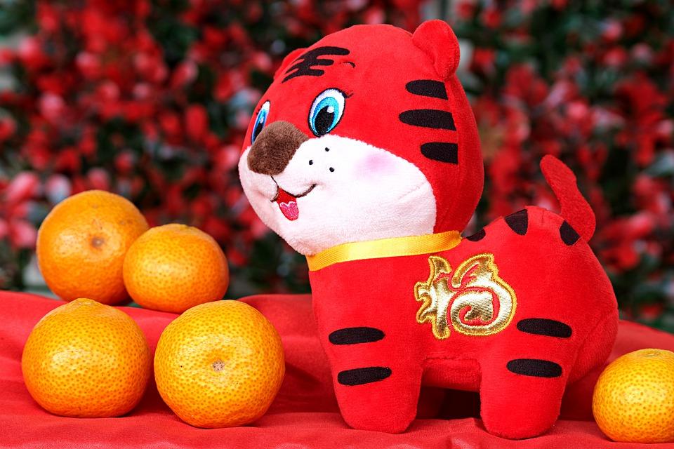 игрушка тигр и мандарины
